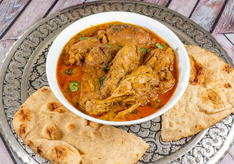 Aromatic Kormas with Nan Served at Chilli Grill takeaway in Glasgow 